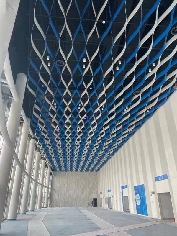 Art Aluminum Museum Ceiling in a contemporary museum exhibition hall.