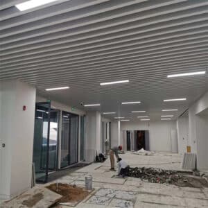 White glossy aluminum baffle ceiling