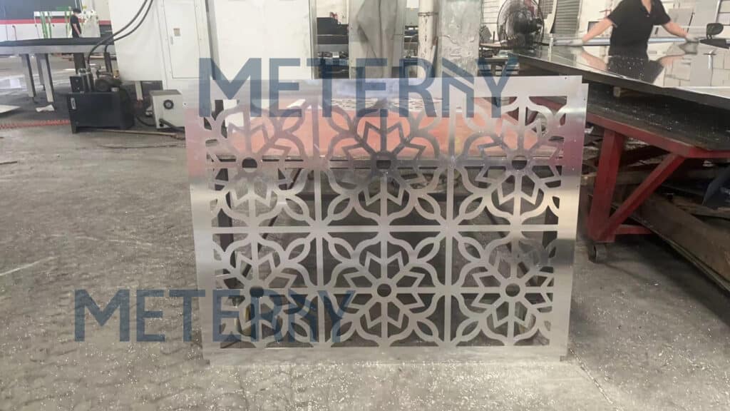 Aluminum Laser Cut Perforated Air Conditioner Cover on the factory production line, before assembly and surface treatment, showcasing its design and preparation for final processing.