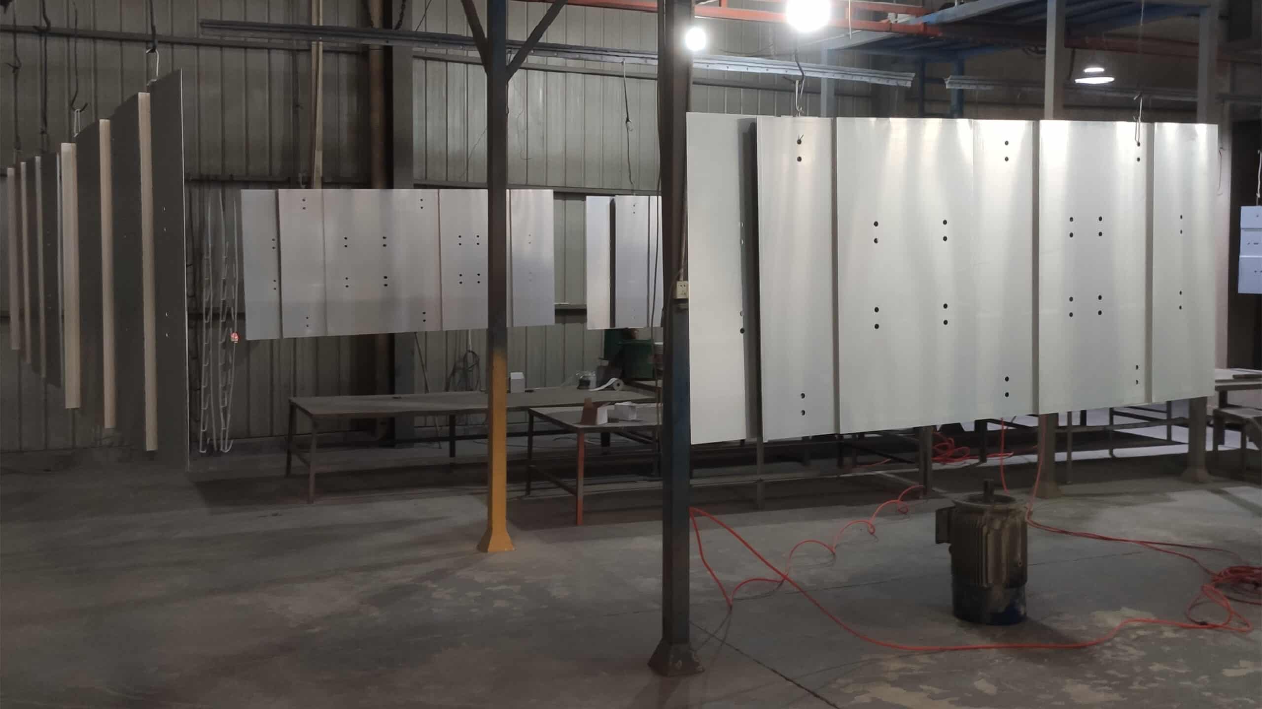 Aluminum Panel Surface Treatment in Meterny's spray painting workshop, prepared for powder coating.