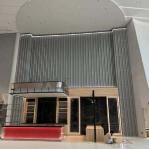 Dubai Toyota showroom wave perforated aluminum decorative wall — primary façade elevation and brand backdrop view.